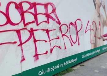 Ho Chi Minh City police charge man over graffiti damage at pedestrian bridge site