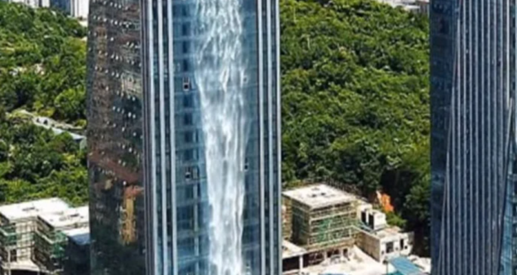 A waterfall flows down from the skyscraper, but the reason is very different.