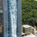 A waterfall flows down from the skyscraper, but the reason is very different.