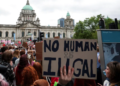 In Northern Ireland, there is a large-scale protest against racism due to a high-profile knife attack