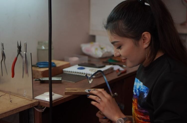 Art at your fingertips. She restores ancient artifacts and makes silver jewelry