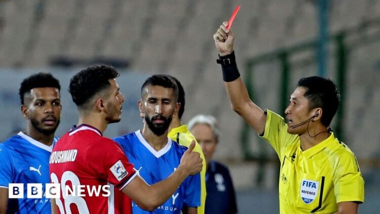 With no team on the field, China fans pin hopes on World Cup refereeMa Ning, known for his stern style, has sparked viral memes and attracted major brand sponsorships.25 mins agoWorld