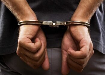 Man arrested after alleged racist rant