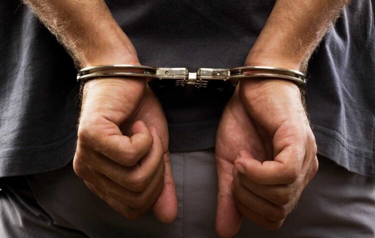 Man arrested after alleged racist rant