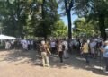 How many people did the opposition protest outside parliament gather? Police data