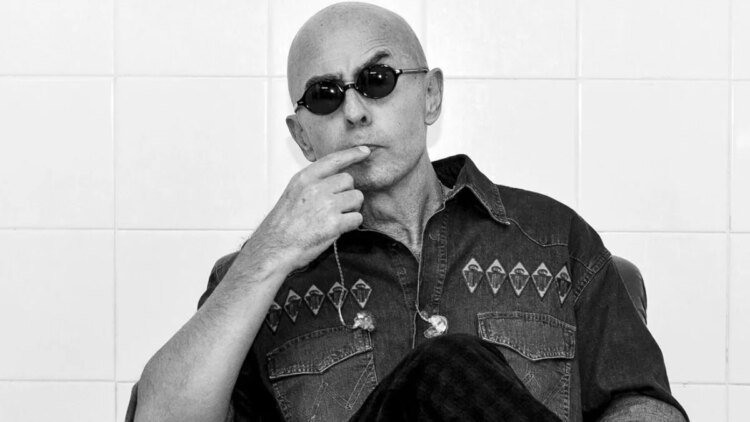 What did Indio Solari die from and what does the official report that notified his death say?