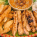 Authorities in Vietnam’s Nha Trang deny rumor that grilled pork sausage contains rat meat