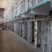 Hundreds of inmates of a prison climbed onto the roof and set fire to the buildings. They allege that they are tortured and abused by the guards