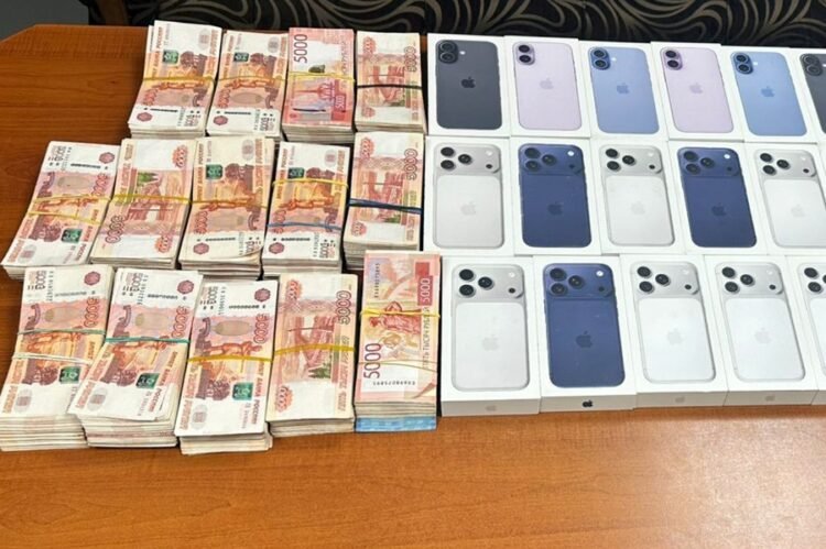 An airport employee tried to take out a package containing 14 million Russian rubles and 30 mobile phones through the official checkpoint.