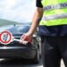 After a misunderstanding in traffic, a car hit a motorcycle and dragged the motorcyclist, then he ran away