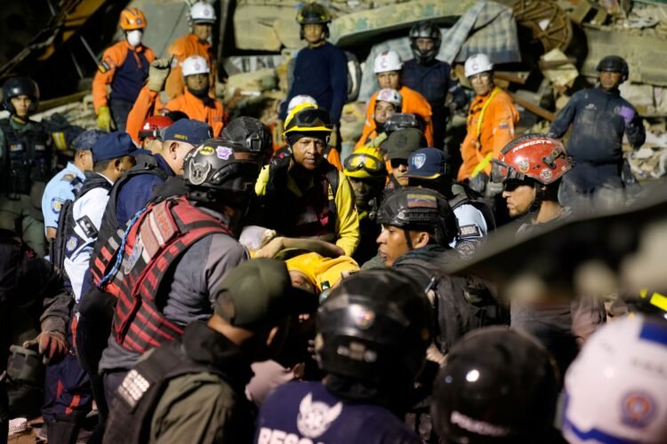 At least 164 dead and 971 injured after powerful quakes rock Venezuela, acting president says