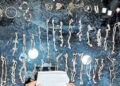 When I opened the heavy plastic tin I found while cleaning the ditch, I saw a collection of silver! | Silver ornaments found in Pooyappally