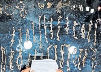 When I opened the heavy plastic tin I found while cleaning the ditch, I saw a collection of silver! | Silver ornaments found in Pooyappally