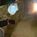 Workers found a 50-meter tunnel hidden in rubble while building a new settlement