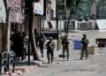 Israeli forces detain Palestinians in West Bank as settler attacks escalate