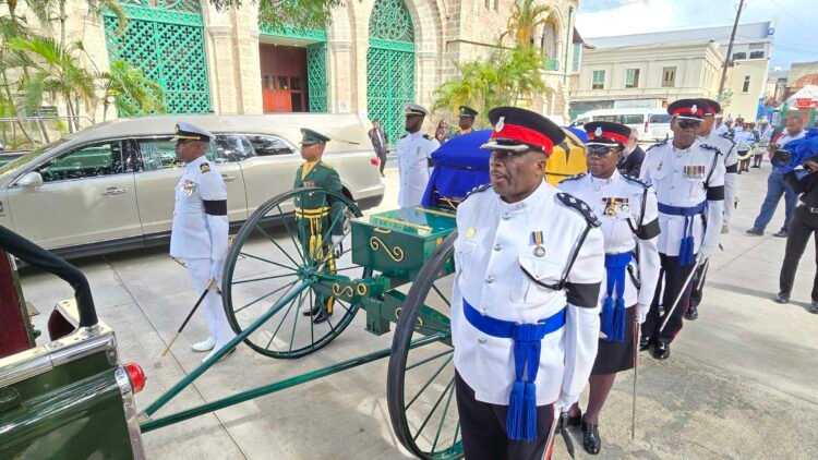 City crowds gather for Sir Garry’s final procession 