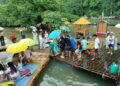 Crowds flock to bamboo rafting at Rathepyan Cave