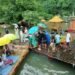 Crowds flock to bamboo rafting at Rathepyan Cave