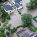 What caused the devastating flooding in parts of Manitoba?