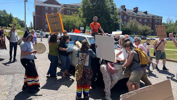 Man charged with intimidation, mischief in Tim Houston protest