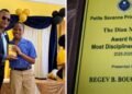 Acting Sergeant Dion Moses presents discipline award at Petite Savanne Primary graduation