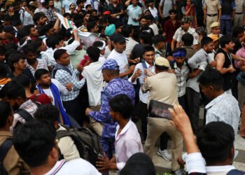 Police in India Use Tear Gas and Batons on Crowds Protesting Exam Scandal