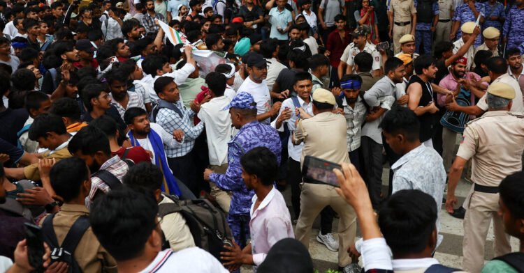 Police in India Use Tear Gas and Batons on Crowds Protesting Exam Scandal