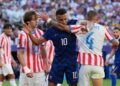 Football: Soccer-France survive Paraguay’s prickly test but warning lights flash