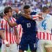 Football: Soccer-France survive Paraguay’s prickly test but warning lights flash