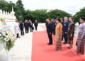 Myanmar President U Min Aung Hlaing and Spouse Daw Kyu Kyu Hla pay tribute at Laos’ Monument of the Unknown Soldier