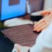 A flex in corporate America, AI ‘tokenmaxxing’ fades as workplaces look to cut tech spending