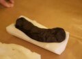 Scientists have for the first time virtually unfolded a scroll that survived the eruption of Vesuvius