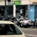 A driver drags several motorbikes parked on Avinguda Sant Antoni de la Massana