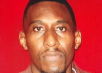 Cop killed in ambushTTPS in manhunt for two suspects after a third killed in exchange of gunfire with officer