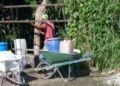 Water: Without water, residents of Alturas del Mirador drink from wells and the Diezmero River