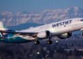 WestJet flight attendants threaten to strike during long August weekend in Canada | World News
