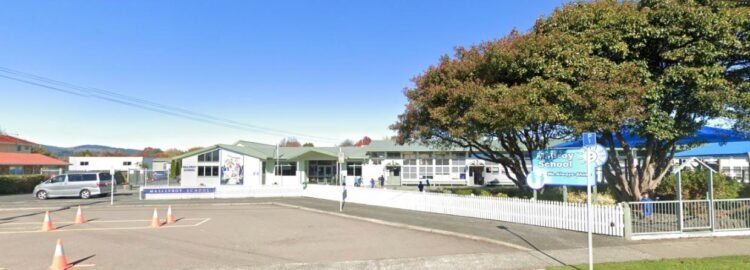 Motorcyclist flees through Rotorua school after crash with police car