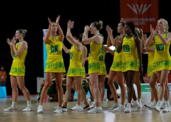 ‘We love our dress’: Aussie netballers defend concerns over length of Commonwealth Games uniform