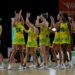 ‘We love our dress’: Aussie netballers defend concerns over length of Commonwealth Games uniform