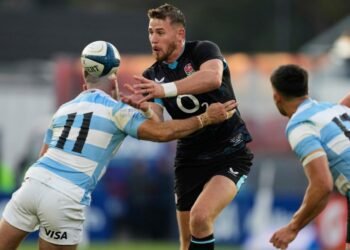 England overcome four yellow cards to edge Argentina
 in thriller
