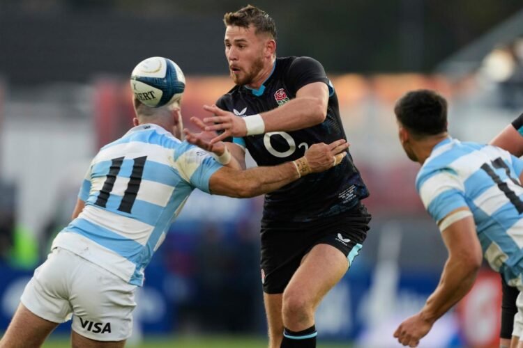England overcome four yellow cards to edge Argentina
 in thriller