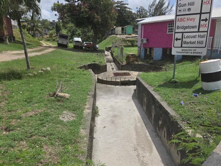 Charles Rowe Bridge folk warn of flood threat as drains remain blocked