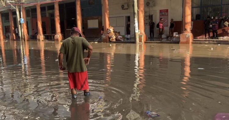 Havana: Rain and clogged sewers form a dirty river