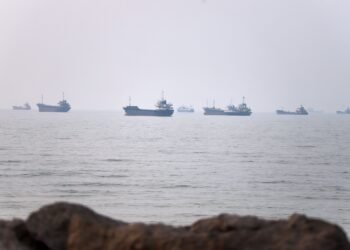 Three tankers hit in the Strait of Hormuz as US revokes license authorizing sale of Iranian oil