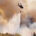 Evacuations as wildfire nears US city