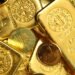 Gold hits one-month peak on lower oil and softer dollar