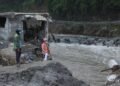 Nepal floods: Rescuers claw through mud as Nepal, China flood missing toll nears 3,000; 630 bodies recovered