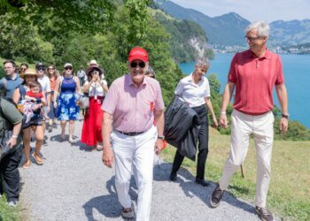 People in traditional dress gather on Rütli on Swiss National Day