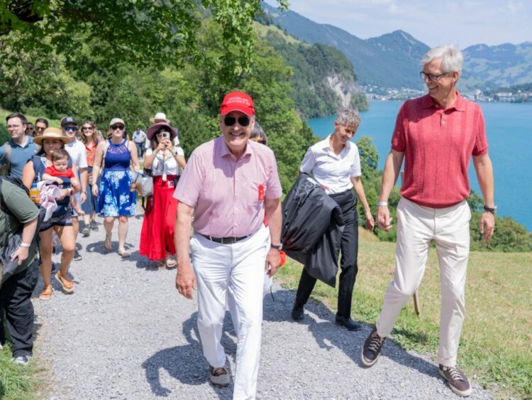 People in traditional dress gather on Rütli on Swiss National Day