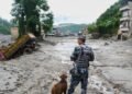 Rescuers retrieve Nepal flood survivors caked in mud | World News